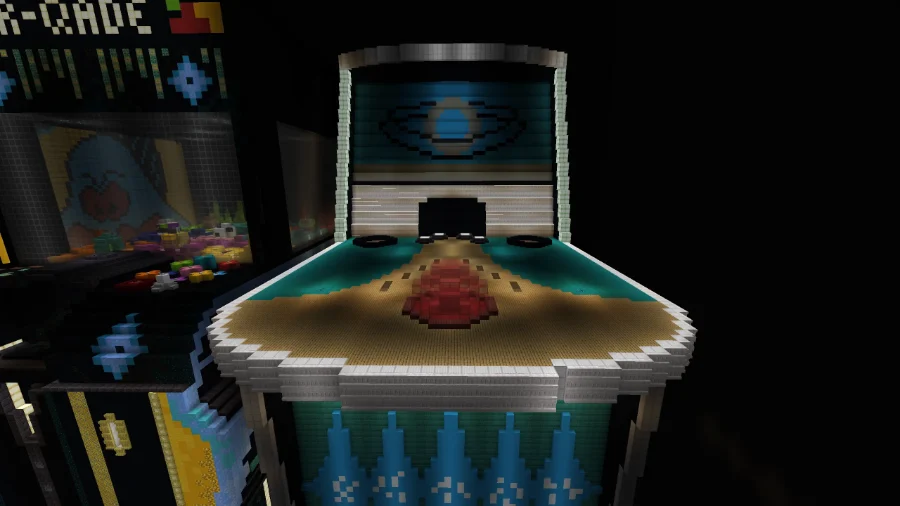 The jukebox cabinet beside the claw machine, its lit backglass glowing over the deck