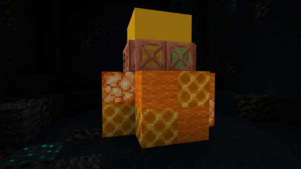 The nic-nak prize — a stacked orange, pink and yellow ornament