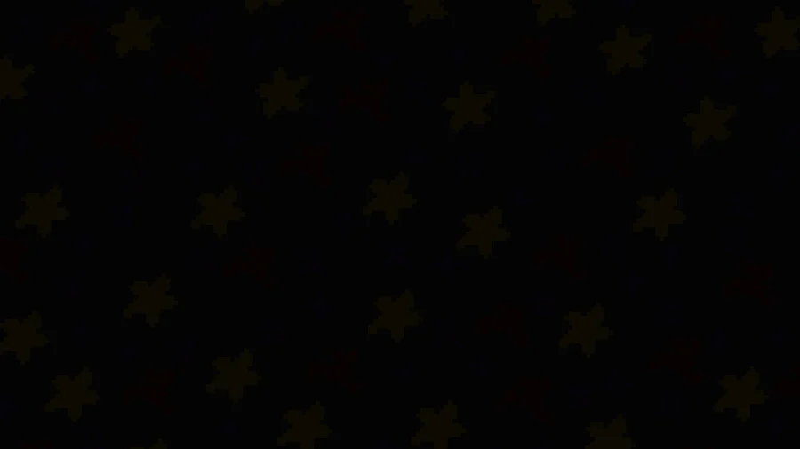 The arcade floor unlit — a near-black surface with barely visible pattern