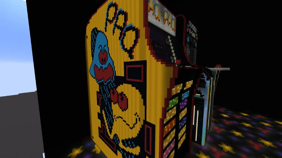 The Pac-Pac cabinet, a tall yellow arcade machine with maze artwork wrapping its side panel